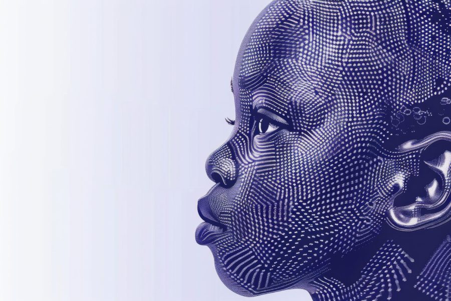 Childs head adorned with colorful dots, resembling a celestial constellation.